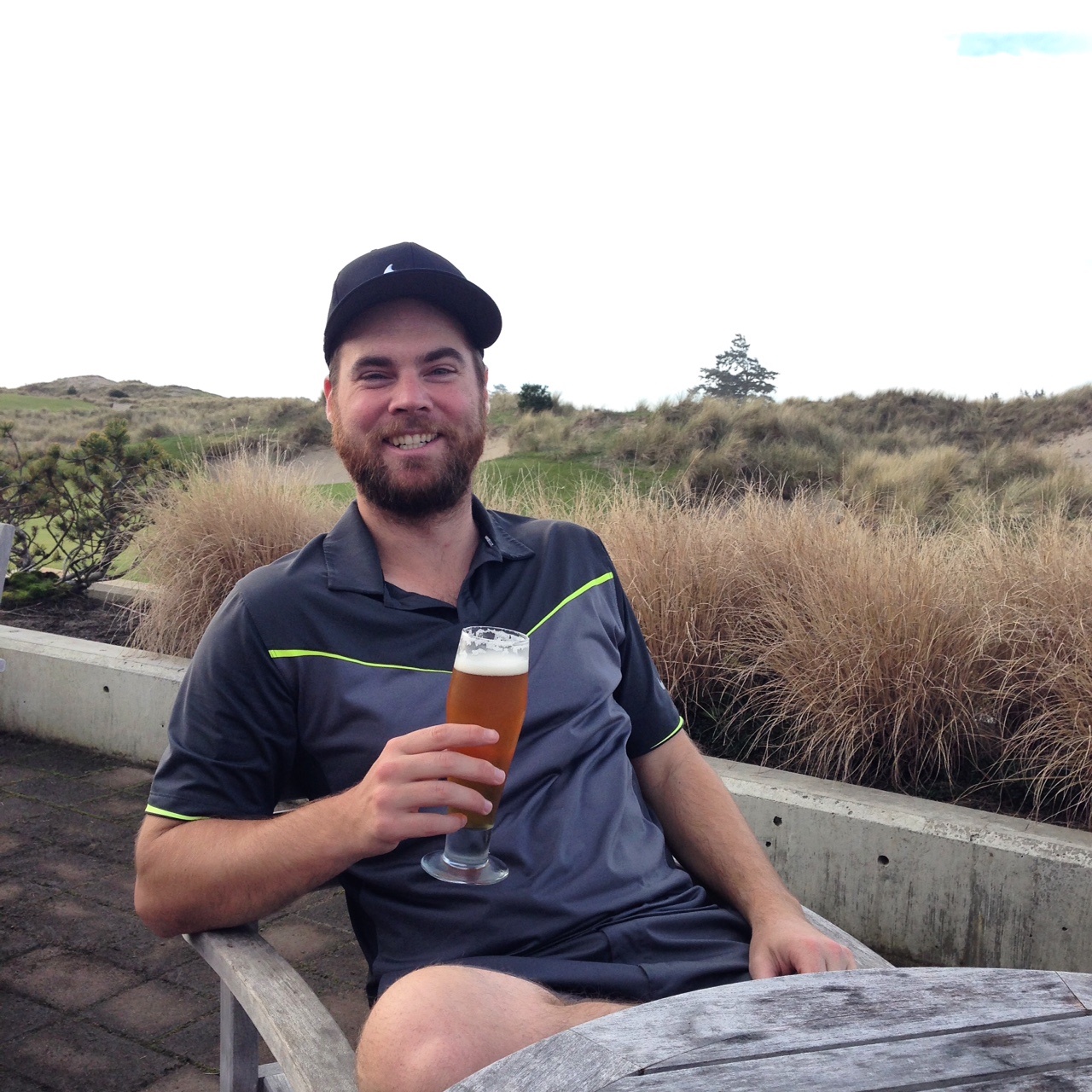 My celebratory beer near the 18th green at Trails. 