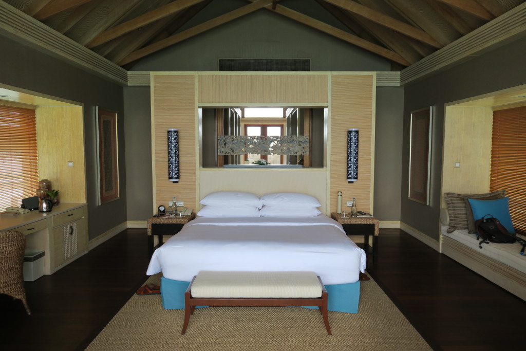 Our king size bed in our water villa.